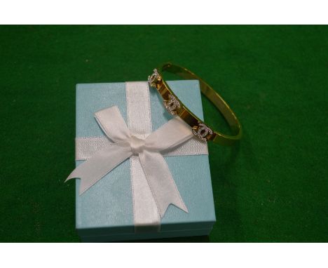 A decorative bangle.