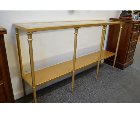 A modern gilt metal and glass console table.