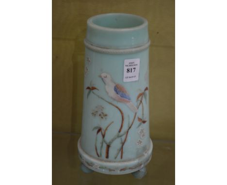 An enamel decorated opaque glass vase.