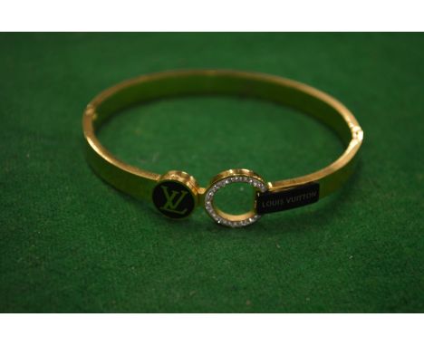 A decorative bangle.