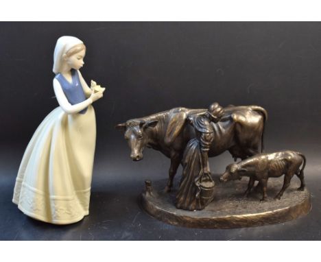 A Nao figure, Girl and Duckling, no.01264, boxed; Heredities figure, Milking Time, boxed (2)