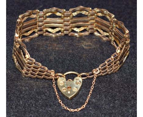 A 9ct gold gate bracelet 14.2g