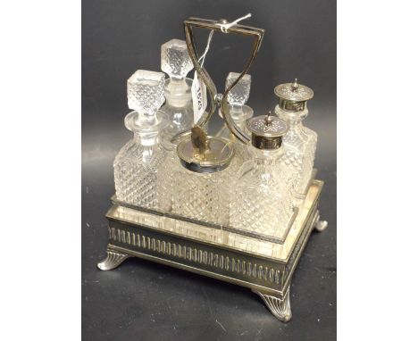 A late 19th century EPNS mounted six bottle cruet stand, by Harrison Brothers and Howson, Sheffield