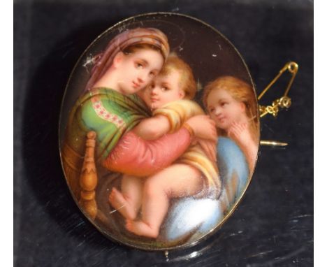 A Victorian porcelain plaque brooch, painted with a maiden clutching children, yellow metal frame and safety chain 