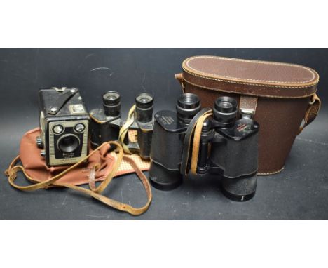 Binoculars - a pair of Taylor and Hobson World War Two issue x 6 magnification, issue no 2976, us 420m; others Greenkat 10x50