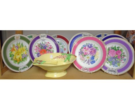 A Carlton Ware Foxglove pattern salad bowl and servers; a set of floral printed collector's plates, Limoges, Spode, others