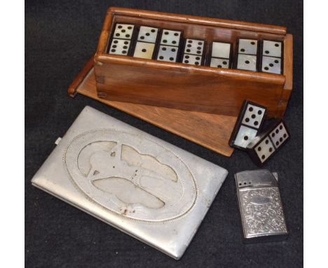 A set of French late 19th century ebony dominoes set with mother of pearl, mahogany box with sliding cover; a World War II al