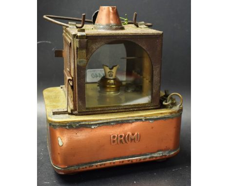 A mixed metal British Rail (M) lamp, rectangular base, iron arched lenses; etc.