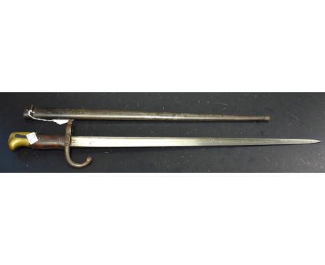 A 19th century 1877 pattern GT Etienne bayonet, scabbard