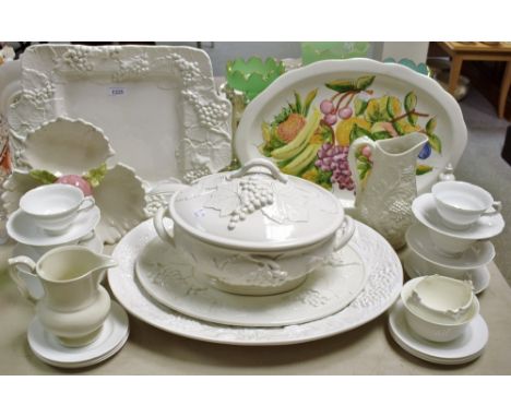 Ceramics - a large tureen and cover decorated with grape vines; accompanying serving platters; other tableware, jugs, bowls, 