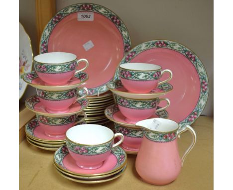 A Collingwood Pink Roses Trellis pattern tea service, including cake plates, cups, saucers, etc.