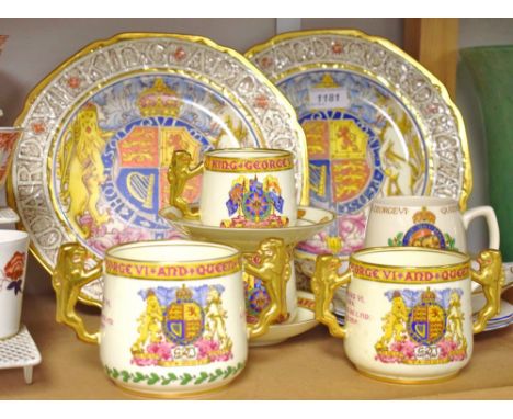 A Paragon George VI & Queen Elizabeth Coronation loving-cup, gilt lion handles, c.1937; another, smaller; a pair of conformin