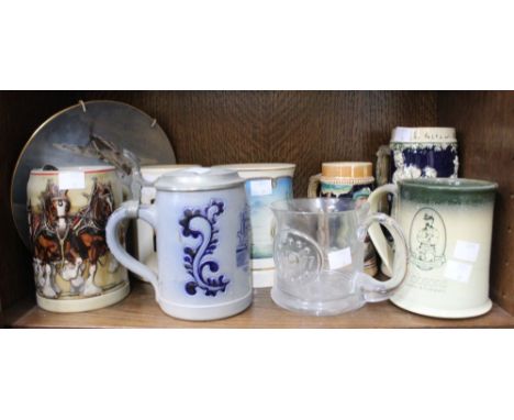 A shelf of Ceramic Beer Tankards, etc