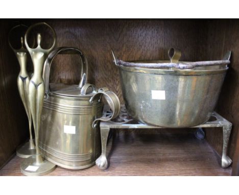 A shelf of Brass Wares to include a Watering Can, Trivet, Jam Kettle, etc