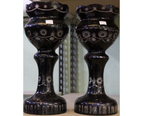 A pair of late Victorian ruby glass etched vases