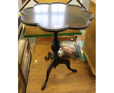 A tripod wine table