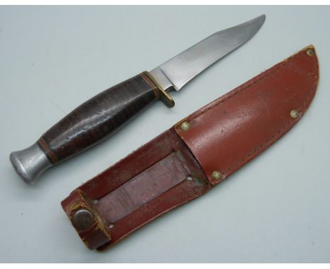 A vintage dagger with scabbard 