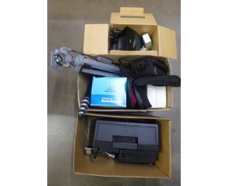 A box with two digital video cameras, Panasonic NV-DX110 DVC and Canon Legria HFS21 and accessories, projector, tripod, viewe