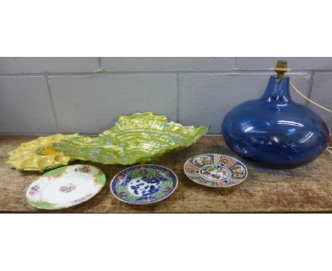 Glass paperweights including one Murano, a blue glass table lamp base, a glass dish, plates, etc **PLEASE NOTE THIS LOT IS NO