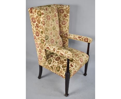 An Edwardian Tapestry Upholstered Porters Wing Armchair 