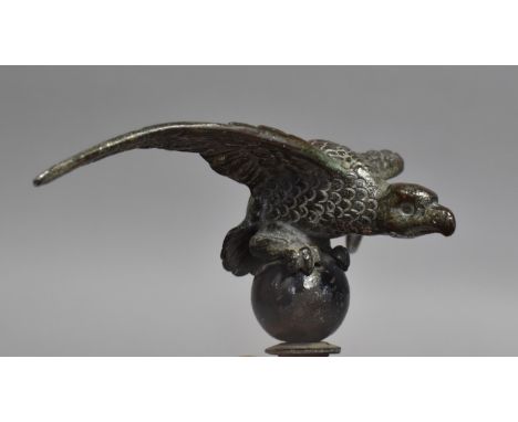 An Early/Mid 20th Century Desmo Car Accessory Mascot in the Form of a Bird with Wings Outstretched Perched on Sphere, Designe