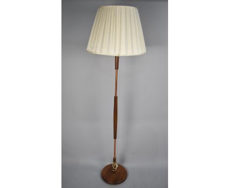 A 1970's Teak and Copper Standard Lamp and Shade 