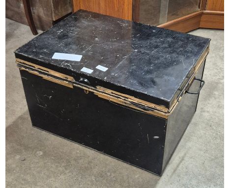 An early 20th Century black metal trunk 