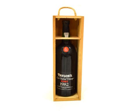 Taylors Late Bottled Vintage Port 1982 in presentation wood case Condition reports are not available for our Interiors Sales.