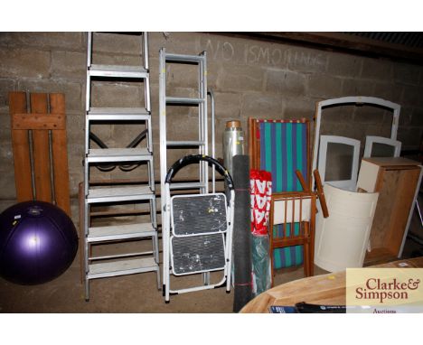 An aluminium step ladder; and a set of steps 