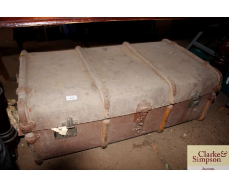 A metal bound travelling trunk 