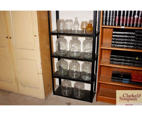 A quantity of glassware to include demi-johns and oil lamp chimneys etc.
