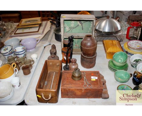 A wooden advertising box; a trinket box in the form of a bell; a carved wooden lion; an egg timer; and various other wooden i