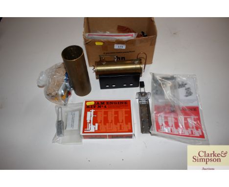 A box containing various steam engine parts
