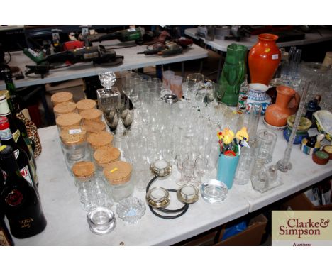 A quantity of table glassware to include storage jars, decanter and stopper, smoked glass glasses, thermometer etc.