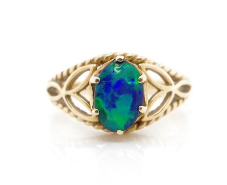 Opal triplet and 14ct yellow gold ring marked 14k. Approx weight 3.4 grams, ring size L