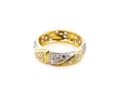 Cubic zirconia set 18ct two tone gold ring marked 750. Approx weight 4 grams, ring size N