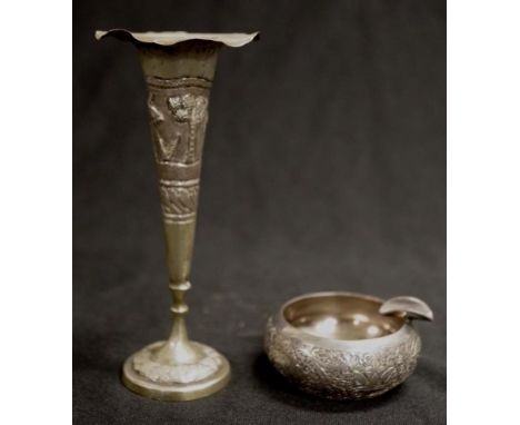 Two Indo-Persian white metal ashtray &amp; posy vase each with embossed decoration, (height 12cm approx).