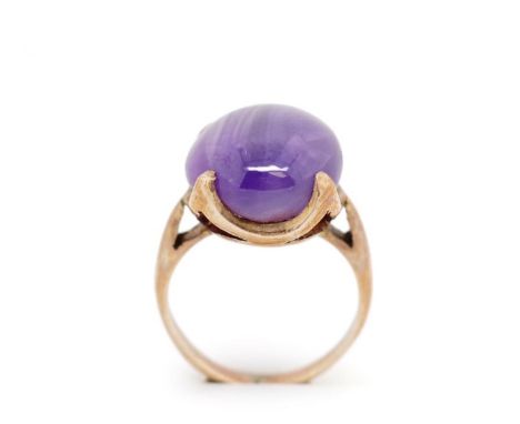 Amethyst and rose gold cocktail ring unmarked. Approx ring weight 5 grams, ring size G. Tests as 9ct