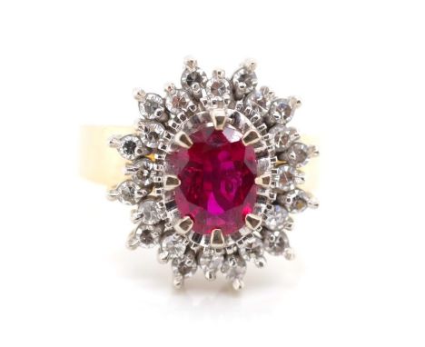 Ruby and diamond set 18ct gold cluster ring marked 18ct. Approx 24x single cut diamonds, 1x oval cut 7.4mm x 5mm x 2.85mm dep