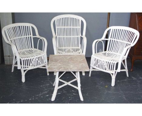 Three vintage cane single seater armchairs and a small marble top table