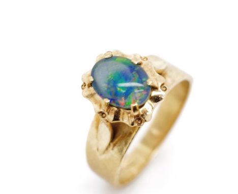 Opal triplet and 9ct yellow gold ring marked 9ct. Approx weight 3.5 grams, ring size K