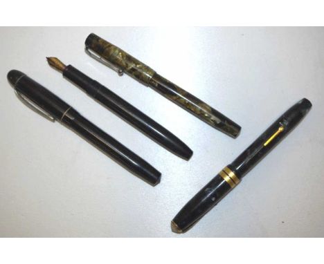 Four vintage fountain pens 2 with 14K nibs, including a Conway Stewart Executive 60, one missing its cap