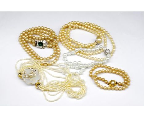 Five faux pearl necklaces includes two vintage double strand examples. Approx lengths 44cm - 54cm