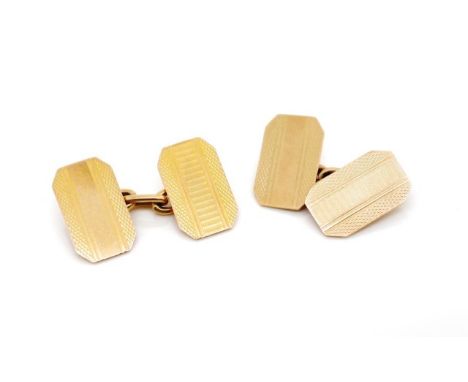 Australian 9ct yellow gold cufflinks with engine turned canted rectangular shields and chain links. Marked 9ct Britannic. App