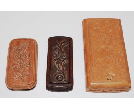 Three various vintage carved timber mystery boxes to include a match striker