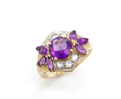 Amethyst set 9ct rose gold ring also with pave set white spinels. Marked 375. Approx weight 2.8 grams, ring size N