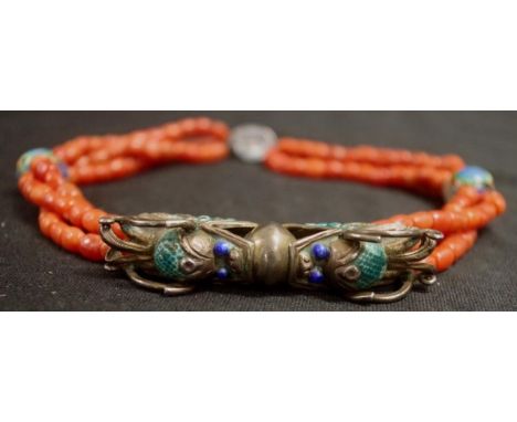 Good Chinese coral &amp; cloisonne necklace comprising three rows of coral beads, with suspended endant piece, dragon form, w