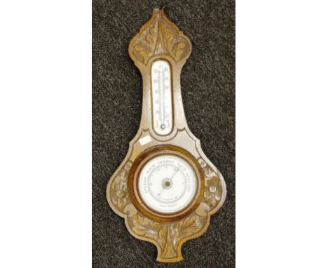 Vintage carved oak barometer with thermometer above, and aneroid barometer below, height 45cm approx