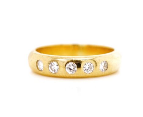 Five stone diamond set 18ct yellow gold ring marked 750. Approx weight 4.2 grams, ring size J