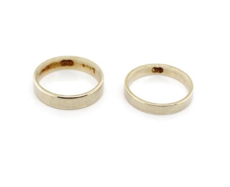 Two 9ct white gold wedding bands marked 375. Approx weight 4.7 grams, ring size J &amp; K